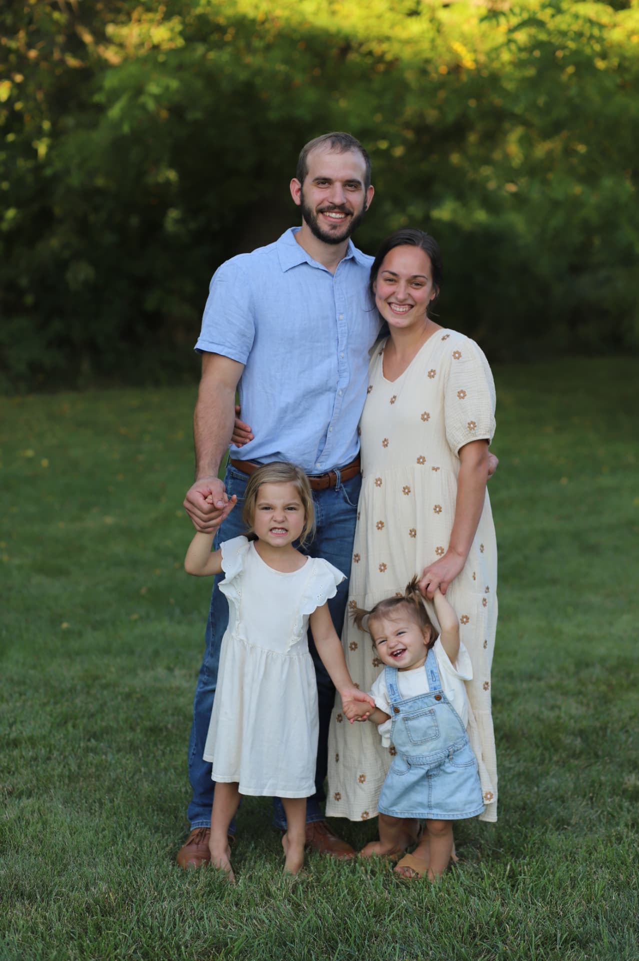 The Fox Ridge Farm family standing together in the pasture
